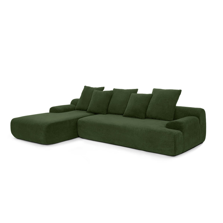Green velvet L-shaped sectional sofa from HouseOfZazla, modern modular couch with plush cushions and sleek design.