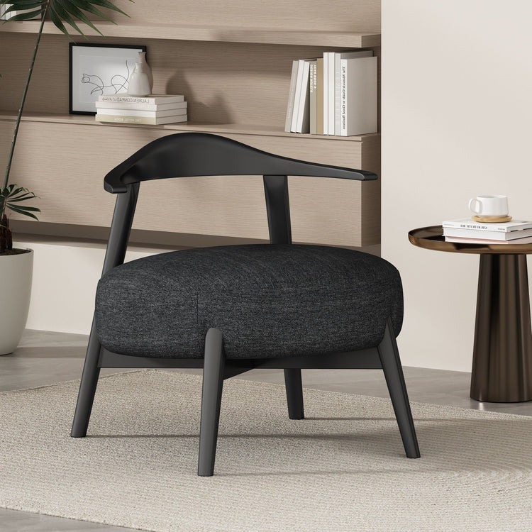 Modern upholstered accent chair with armless design and birch wood legs, ideal for living room decor.