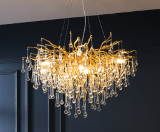 Decorbites luxury chandelier with water drop crystal design, featuring elegant light for modern interior decoration.