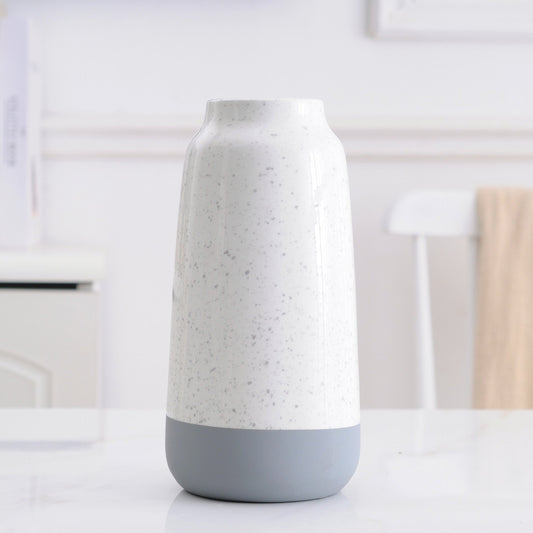 White and gray ceramic vase with modern design, ideal for floral home decor, by FLIPSTYLEZLLC.