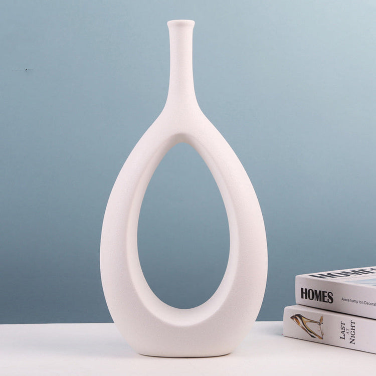 Modern ceramic vase with simple and special shapes, decorated with flower arrangement, ideal for luxurious home decor by FLIPSTYLEZLLC