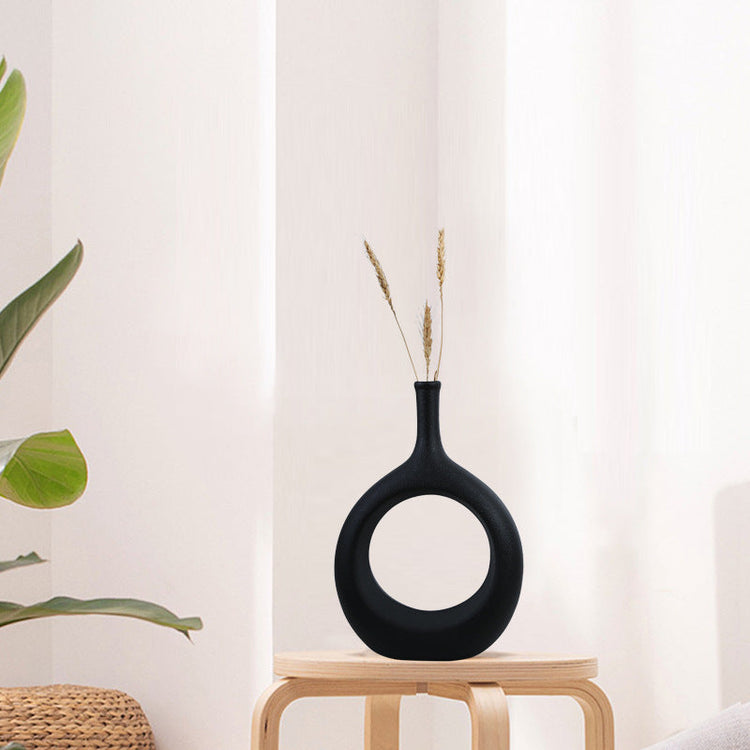 Elegant ceramic vase with flower arrangement, modern design, light luxury home decor by FLIPSTYLEZLLC.