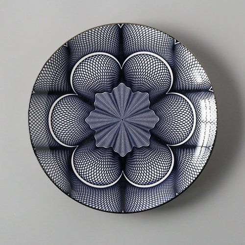 Decorative plate with geometric pattern on a gray background