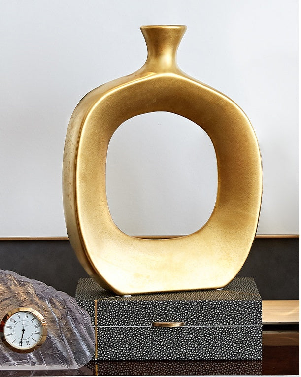 Modern ceramic vase by FLIPSTYLEZLLC, simple and creative living room decoration with sleek design and neutral finish.