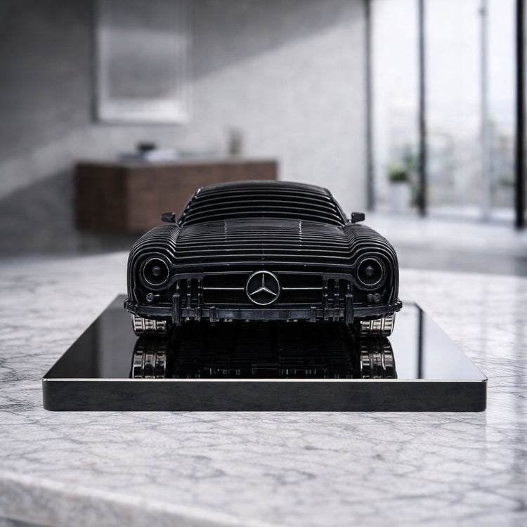 Handcrafted metal car sculpture by Modello Turbo featuring CNC laser-cut steel, aluminum alloy wheels, and titanium stainless steel base.