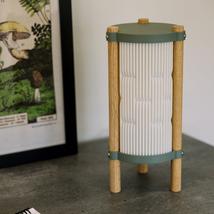 Terra Labs Toro table lamp with a sleek modern design and neutral-colored shade, perfect for contemporary home decor.