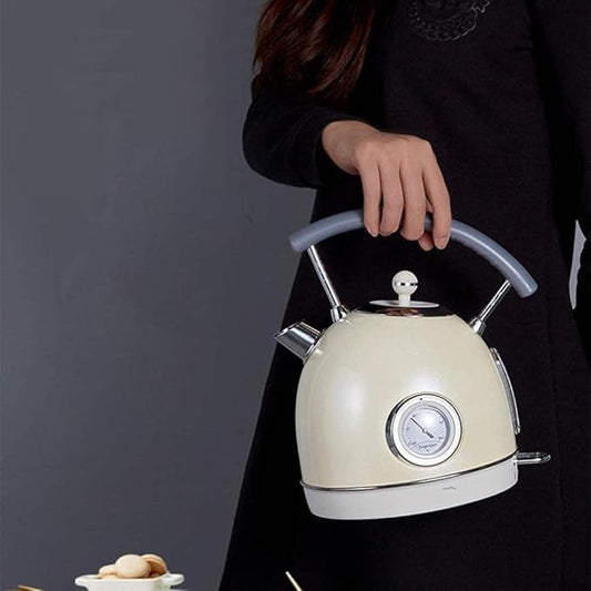 SmartPursue™ electric kettle with built-in thermometer, stainless steel body, and ergonomic handle for easy pouring.