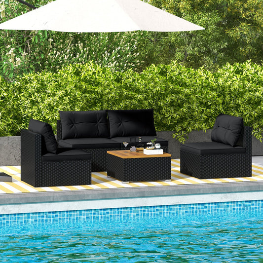 Black wicker outdoor chair set with five pieces, including chairs and table, for patio seating by DirectDeals.