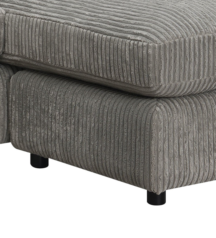 Gray Tavia L-shape reversible sectional sofa with corduroy fabric, pocket coil cushions, and six decorative pillows.