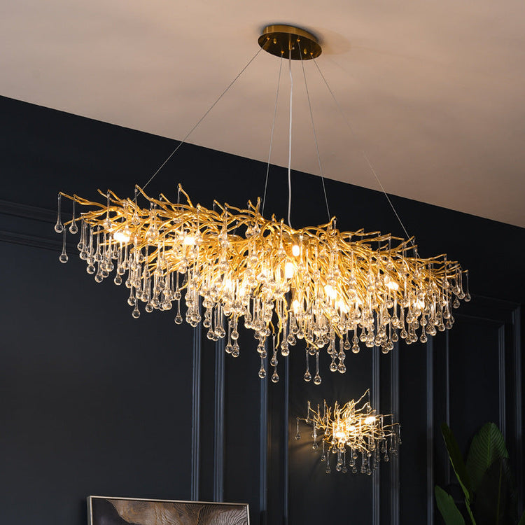 Decorbites Postmodern Light Luxury Crystal Chandelier with Water Drop Design, creating elegant atmosphere and shimmering illumination.