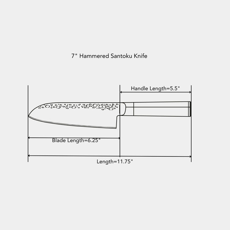 Swiss Diamond 7-inch hammered Santoku knife with a textured blade for precise slicing and chopping in the kitchen.
