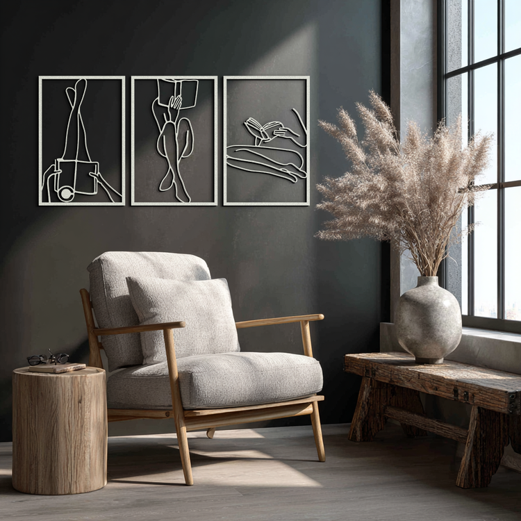 Modern metal wall art of a woman reading, crafted from steel by Enova Art, featuring minimalist and contemporary design elements.