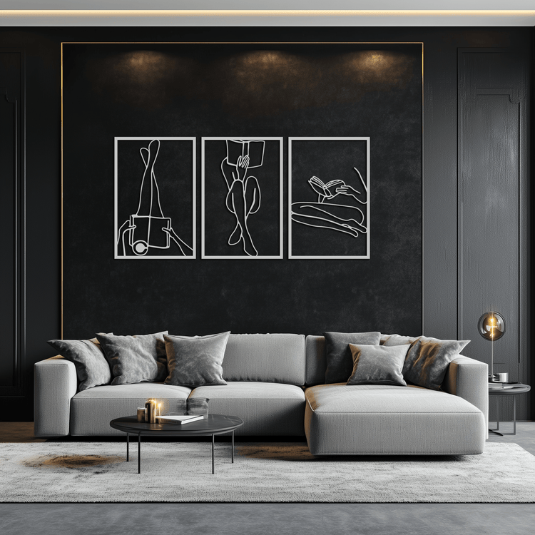 Modern metal wall art of a reading woman by Enova Art, minimalist steel decor for contemporary interior design.