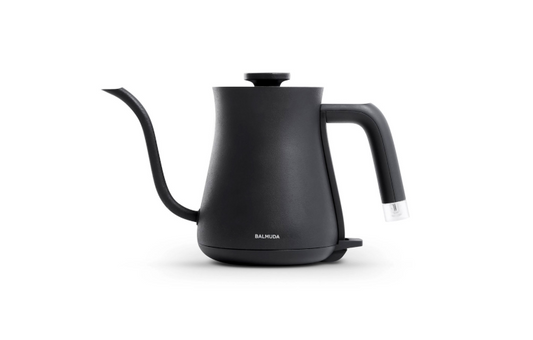 Black BALMUDA The Kettle electric kettle with sleek design, front view showing the spout, handle, and control panel.