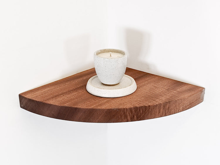 Handmade mahogany corner wall shelf by NookWoodworking, floating storage shelf with smooth finish and natural wood grain.