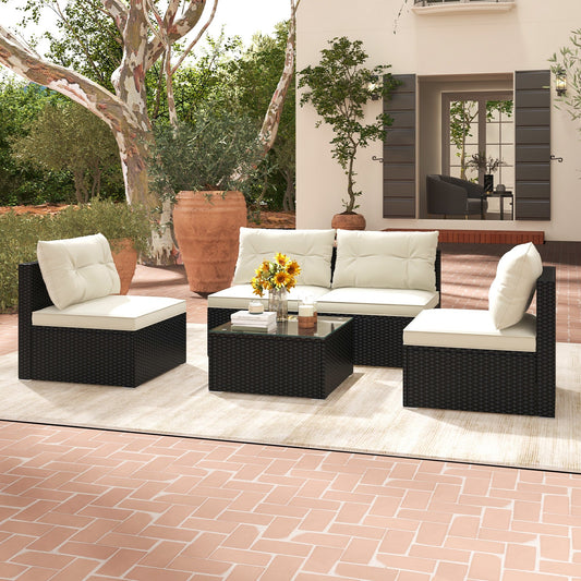 Five-piece outdoor patio furniture set with black wicker chairs and table, featuring cushions for comfortable outdoor seating.