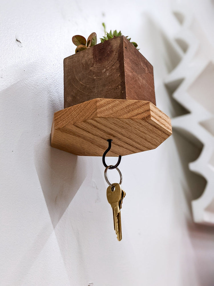 Wooden octagon key hook shelf in oak, wall-mounted entryway shelf with hooks, crafted by NookWoodworking.