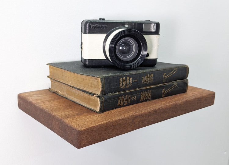 Natural oak floating wall shelf by NookWoodworking, 6 to 36 inches, minimalist design for modern home decor.