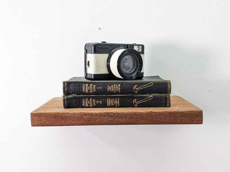 Natural oak floating wall shelf from NookWoodworking, 6 to 36 inches, minimal design for modern home decor.