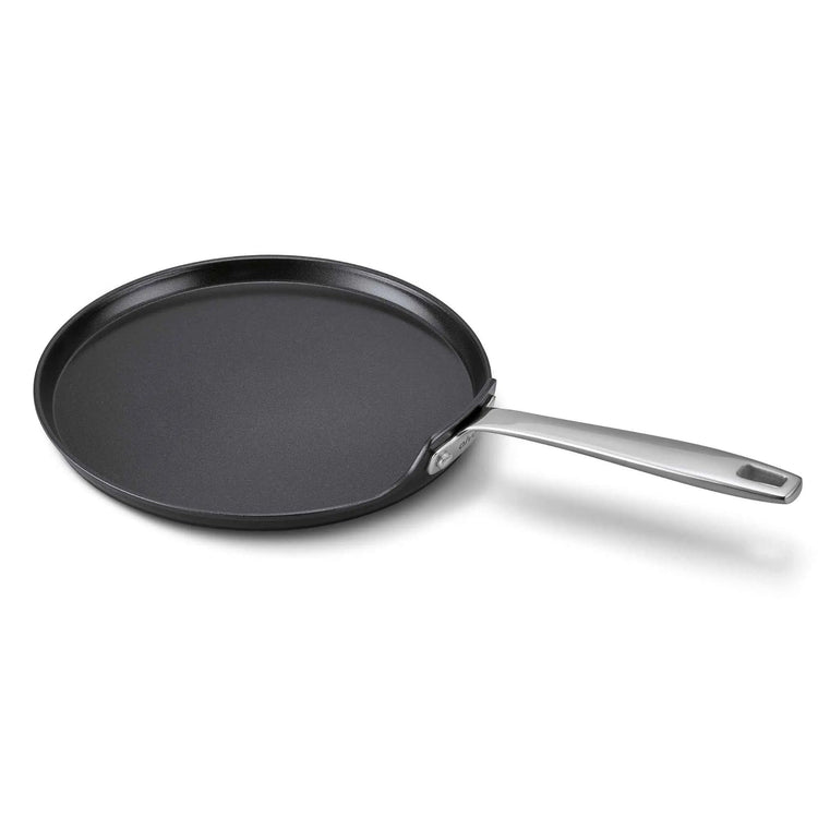 Alva Cookware 10-inch crepe and egg pan with non-stick surface, perfect for making pancakes and breakfast dishes.