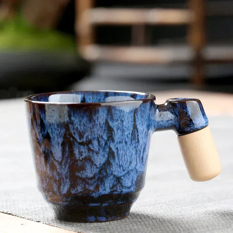 DecorBites ceramic latte mug with wooden handle, 130-150ml coffee cup, featuring a stylish design and comfortable grip.