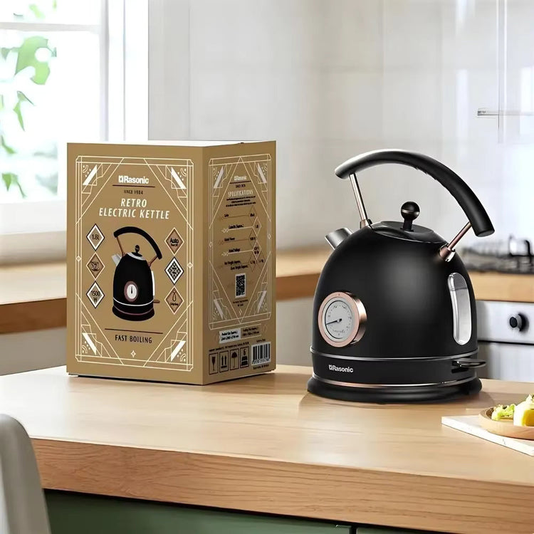 SmartPursue™ electric kettle with built-in thermometer, stainless steel body, and ergonomic handle for boiling and temperature control.