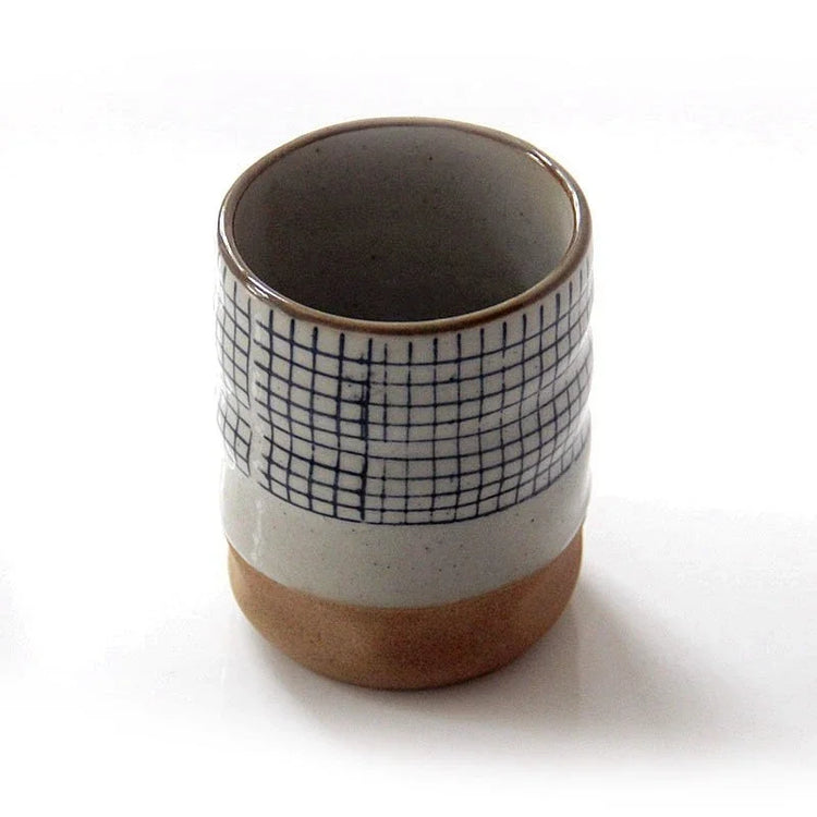 Hand-painted Japanese porcelain tea cup by Decorbites, eco-friendly ceramic mug with floral design, 100ml to 200ml capacity.