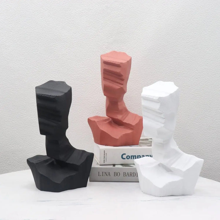 Modern resin abstract characters sculpture decoration featuring artistic, flowing forms for contemporary interior accents.