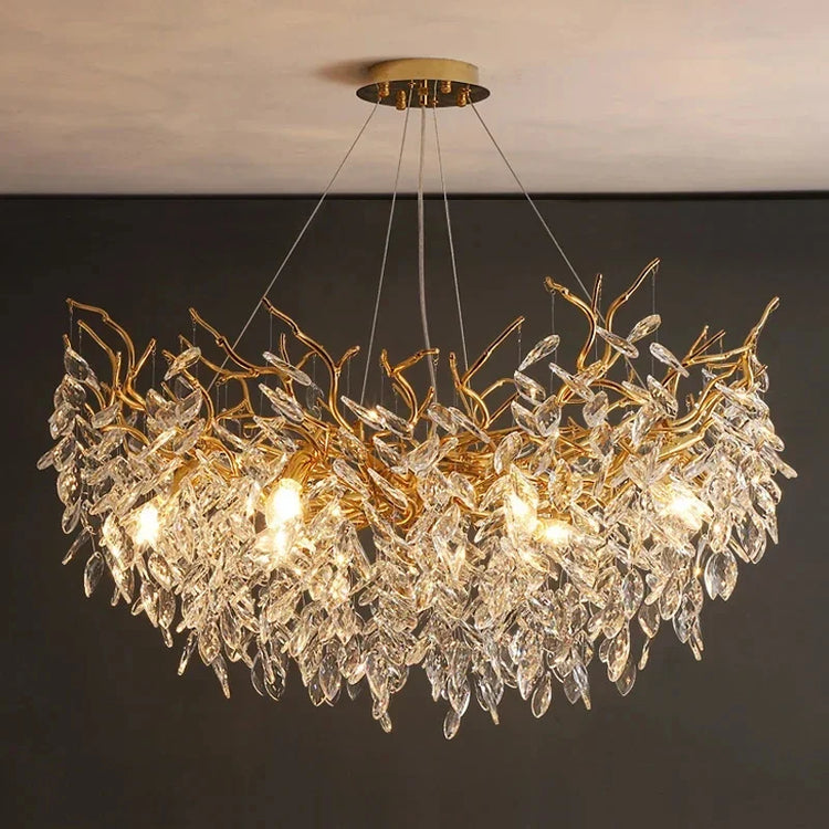 Gold crystal LED chandelier by DECORBITES featuring cascading crystal accents and warm LED lighting for elegant interior decor.