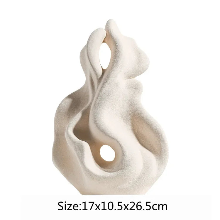 Modern ceramic curl sculpture decor by Decorbites, featuring sleek porcelain art accent with intricate twisted design.