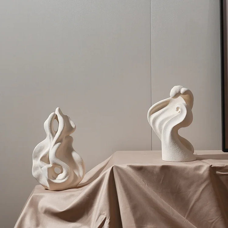 Modern ceramic curl sculpture decor by Decorbites, showcasing a sleek porcelain art accent with smooth, flowing design elements.