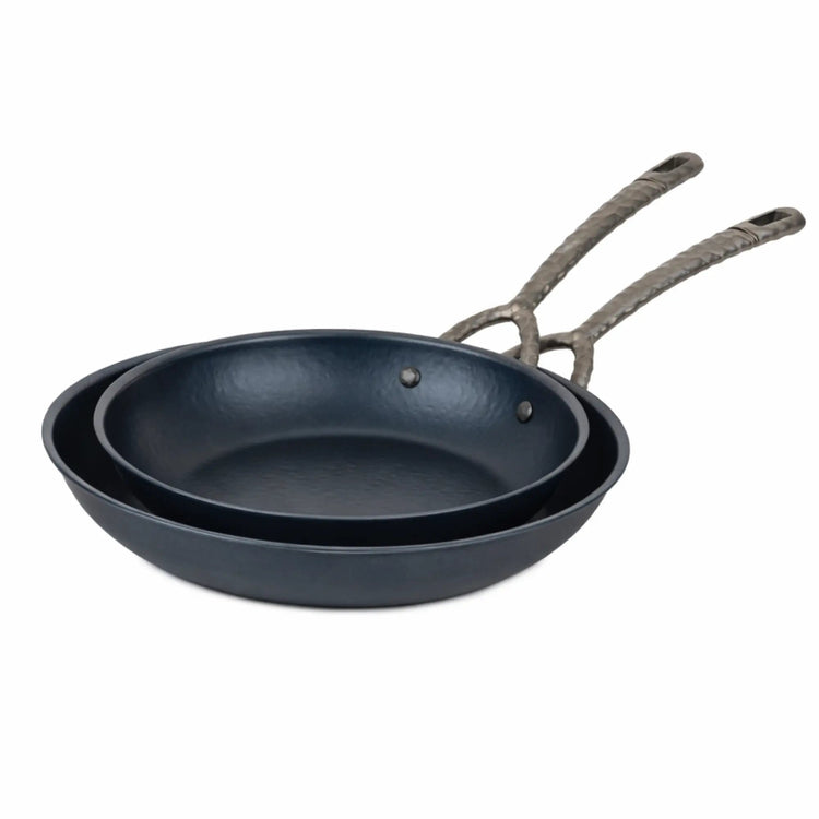 Alva Cookware frying pan with non-stick surface and ergonomic handle, shown on a stovetop for versatile cooking.