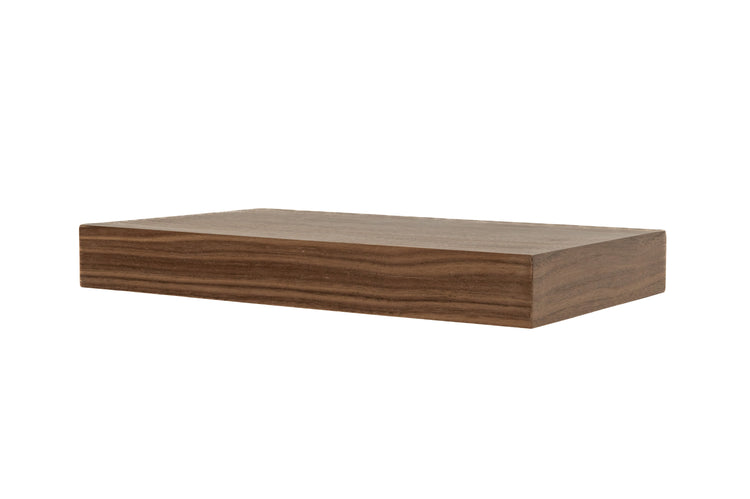Walnut wood floating kitchen shelves by Dogberrycollections mounted on a wall, showcasing their sleek, modern design for kitchen storage.