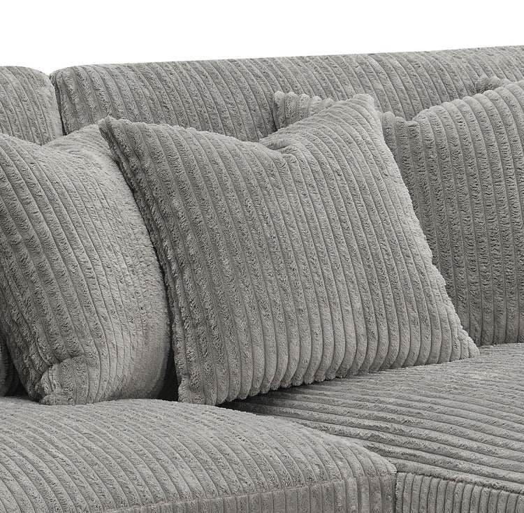 Gray Tavia L-shape reversible sectional sofa by HouseOfZazla with corduroy fabric, pocket coil cushions, and six pillows in a living room setting.