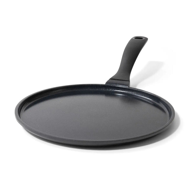 Alva Cookware 11-inch nonstick crepe and egg pan with a flat griddle surface for breakfast dishes.