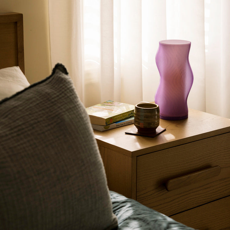 Purple Terra Labs Woogie Table Lamp with rounded base and soft fabric shade, ideal for modern home decor.