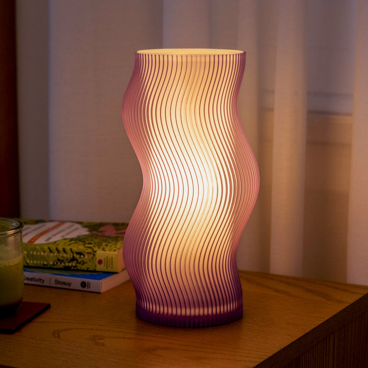 Purple Terra Labs Woogie Table Lamp with a playful, rounded design suitable for modern home decor.