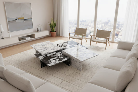 Set of modern marble nesting coffee tables with sculptural square design by Zicana Boutique, featuring sleek, contemporary marble surfaces.