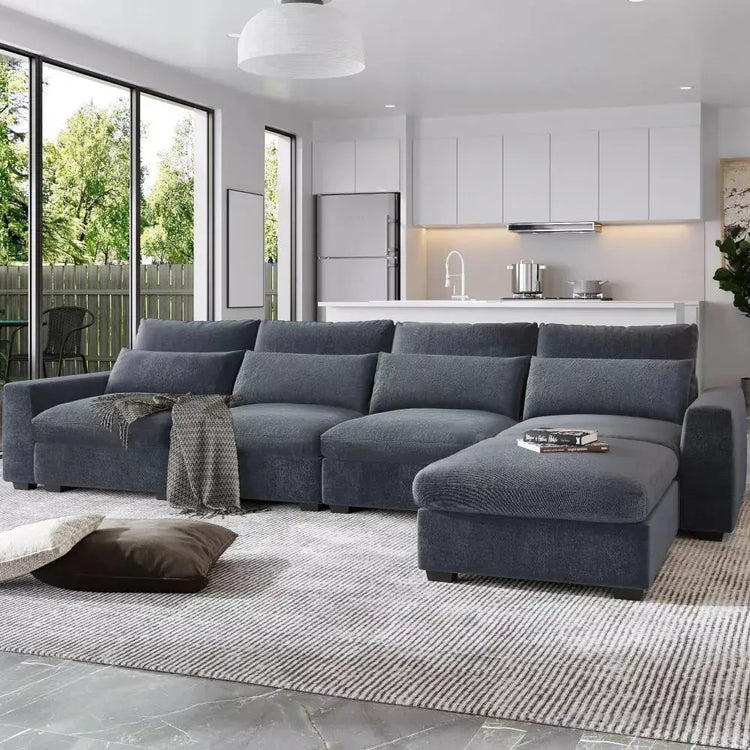 Canva Home oversized modular L-shape sectional sofa in linen fabric with four pillows, 129 inches wide and 1100 lb capacity.