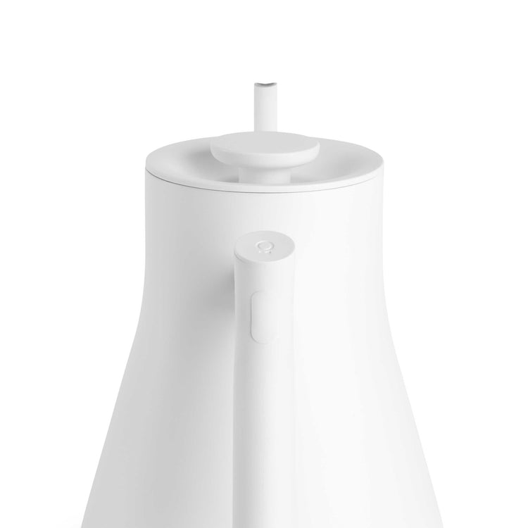 Fellow Stagg EKG Pro electric kettle in matte white, with sleek design and digital temperature control for brewing tea and coffee.