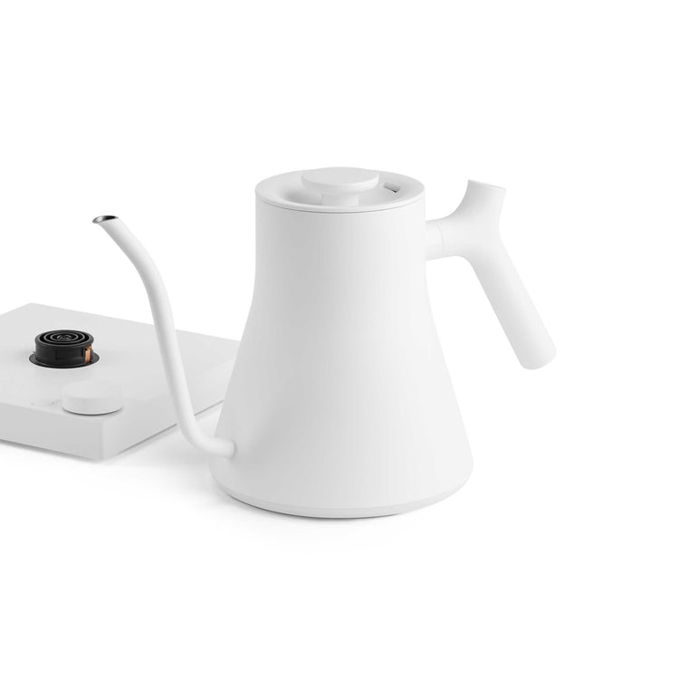 Fellow Stagg EKG Pro electric kettle in matte white with digital display and gooseneck spout for precise pouring.