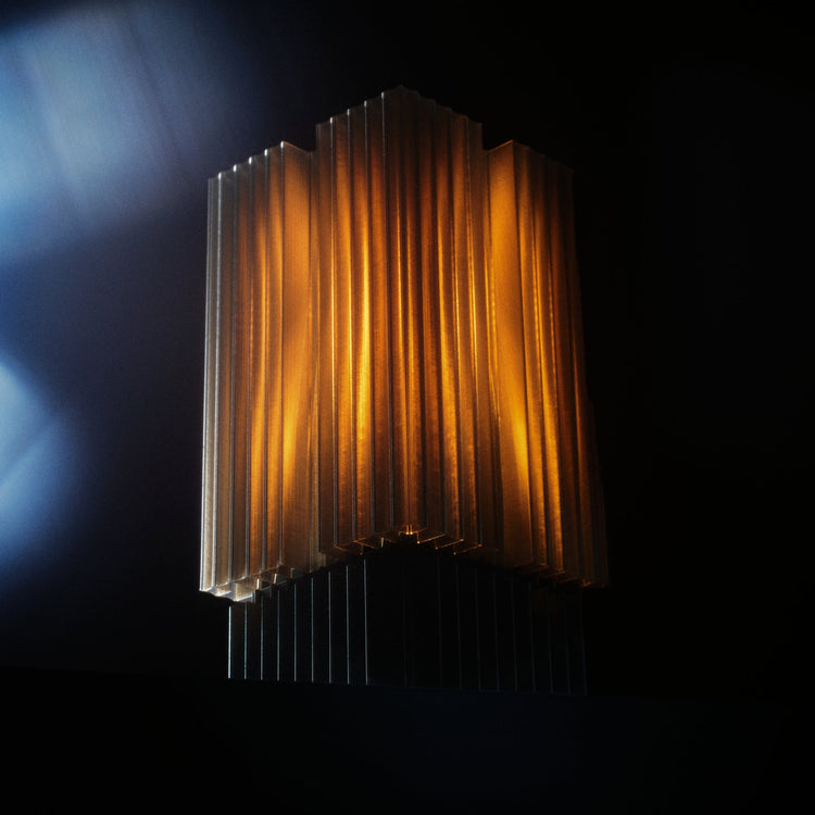 Wooj Design Brut Lamp, a 3D printed sculpture inspired by brutalist architecture with a smoky finish.