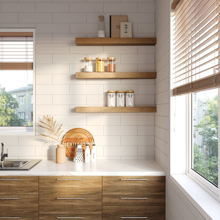 Real wood floating kitchen shelves by Dogberrycollections mounted on a wall for stylish storage and display in a modern kitchen.