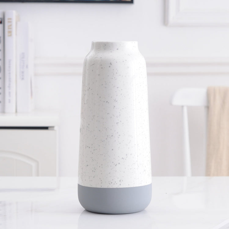 White and gray ceramic vase with a modern design, ideal for floral home decoration, by FLIPSTYLEZLLC.