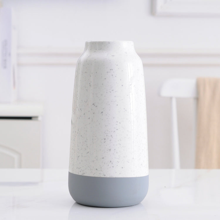 White and gray ceramic vase with modern, minimalist design, perfect for floral home decor by FLIPSTYLEZLLC.