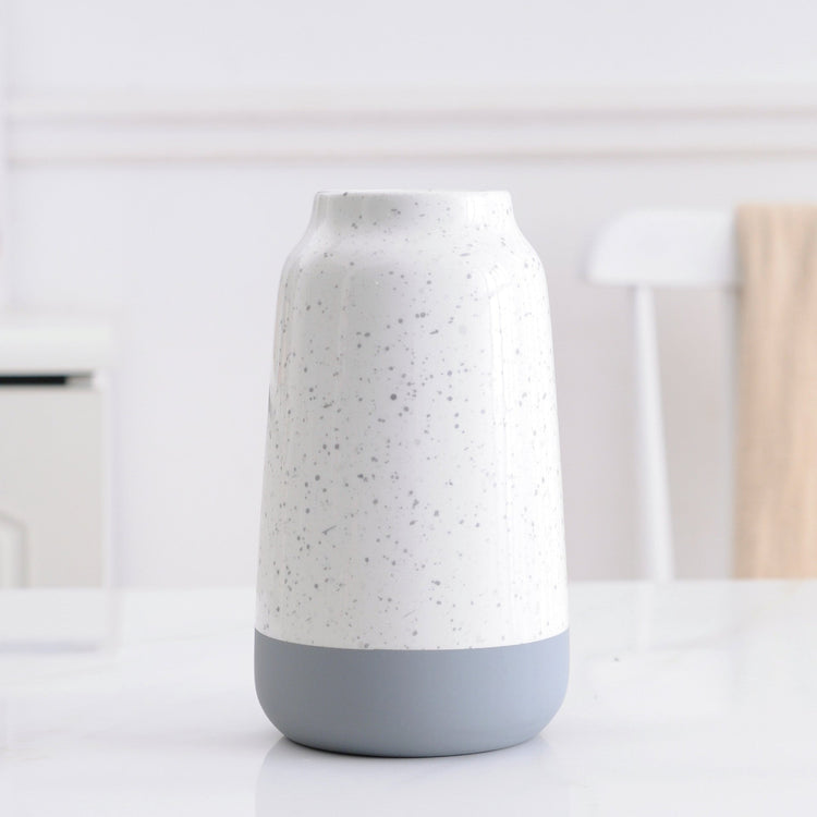 White and gray ceramic vase with a simple, modern design, perfect for home floral decoration, by FLIPSTYLEZLLC.