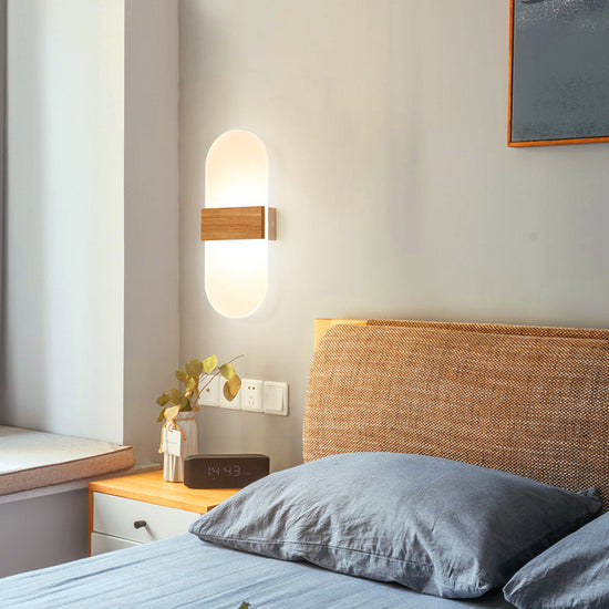 Modern wooden LED wall lamp by FLIPSTYLEZLLC, ideal for living rooms, bedrooms, and study areas, providing soft ambient lighting.