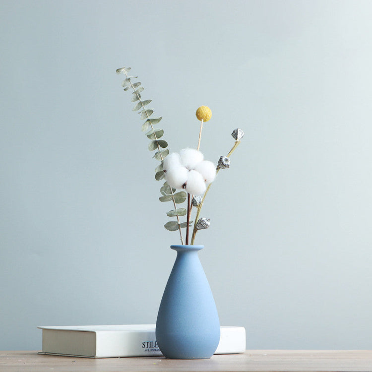 Small ceramic dry vase by FLIPSTYLEZLLC, Nordic-style living room flower arrangement with a simple, modern design.