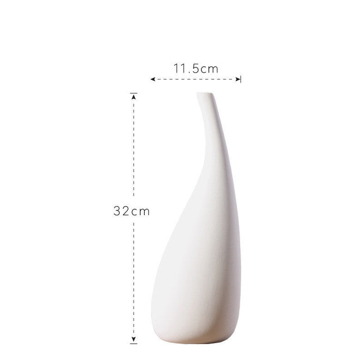 White ceramic water drop vase with dried flowers, modern design by FLIPSTYLEZLLC, ideal for minimalist room decor and flower arrangements.