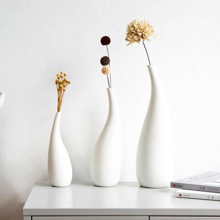 White ceramic water drop vase with dried flowers, modern design, decorative flower ornament by FLIPSTYLEZLLC